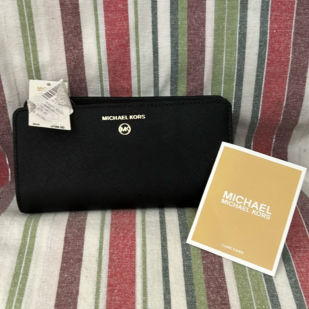 Beautiful never used Michael Kors black wallet, tag still on make offer